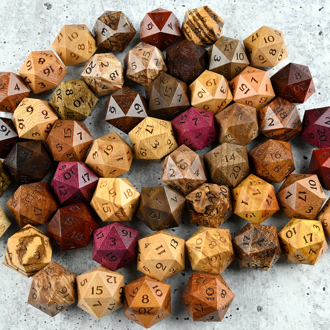 A variety of wood D20 dice for dnd ttrpg