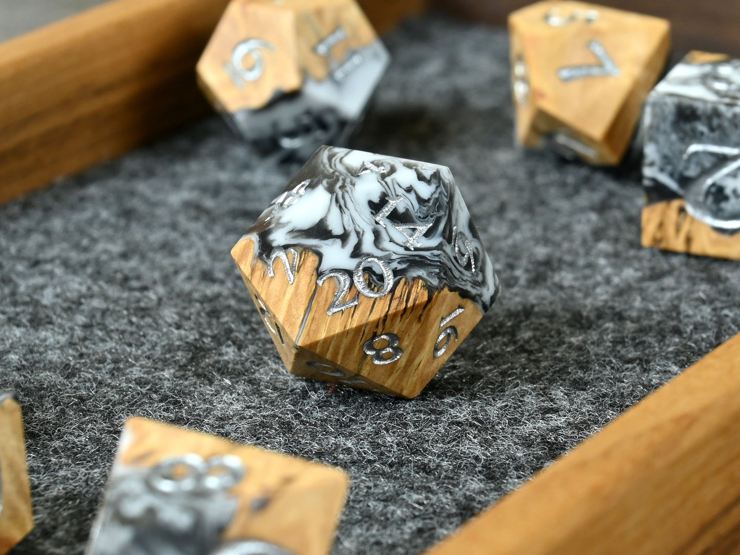 Shadowstuff Coolibah wood and resin hybrid dice set for D&D ttrpg.