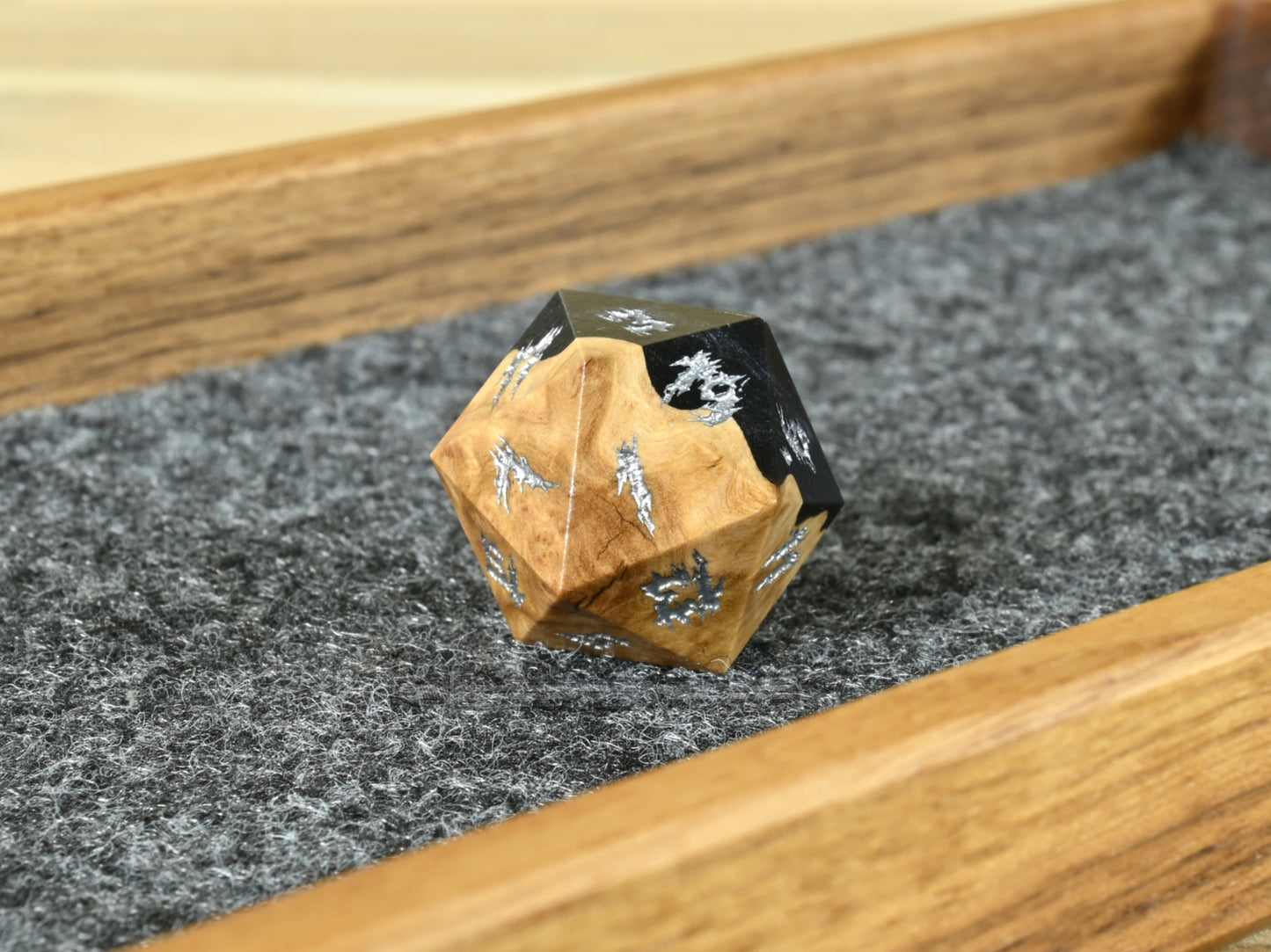 Void brown mallee burl wood and resin d20 dice.