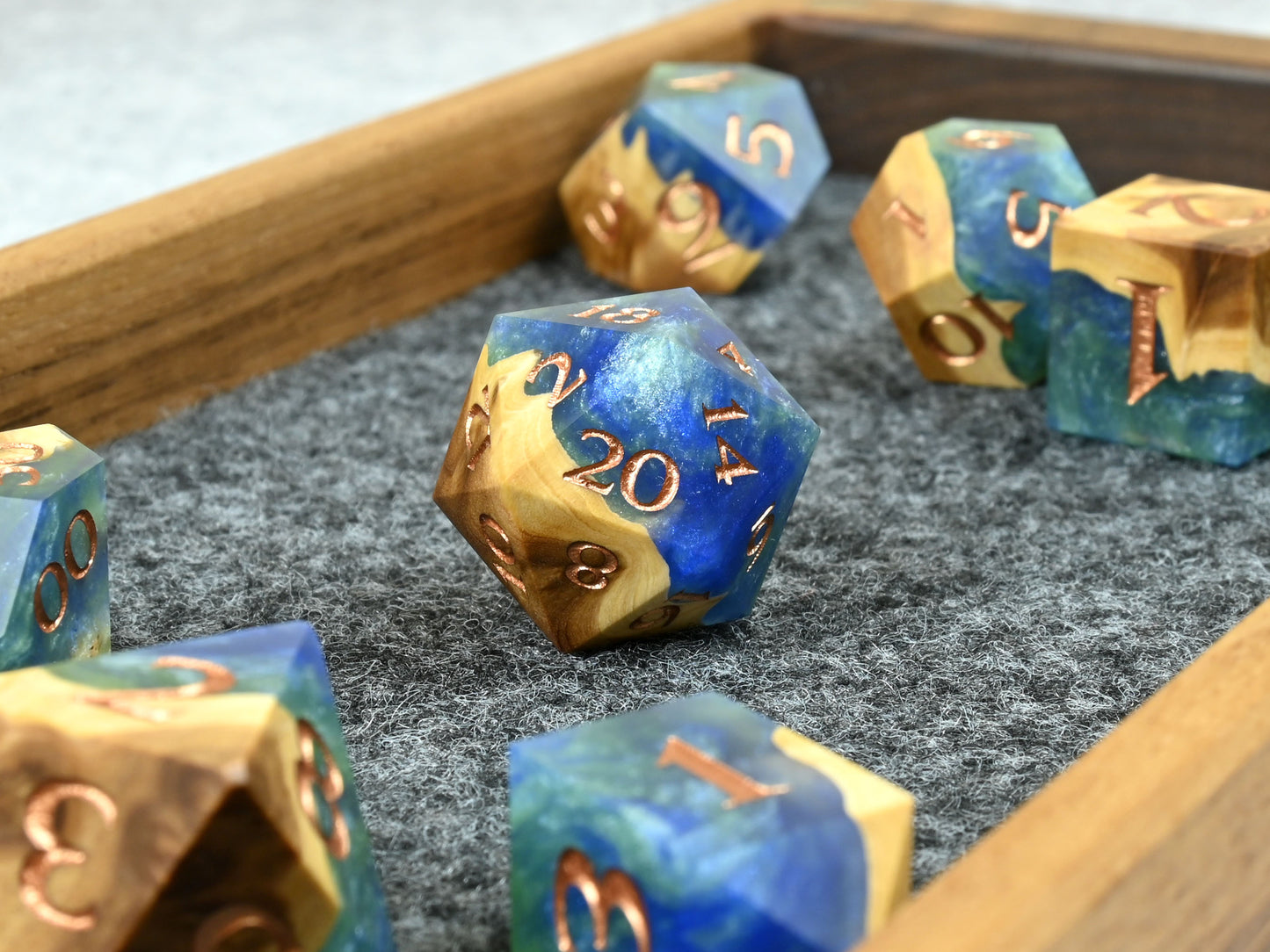 Earth magic brown mallee burl wood and resin hybrid dice set for D&D ttrpg.