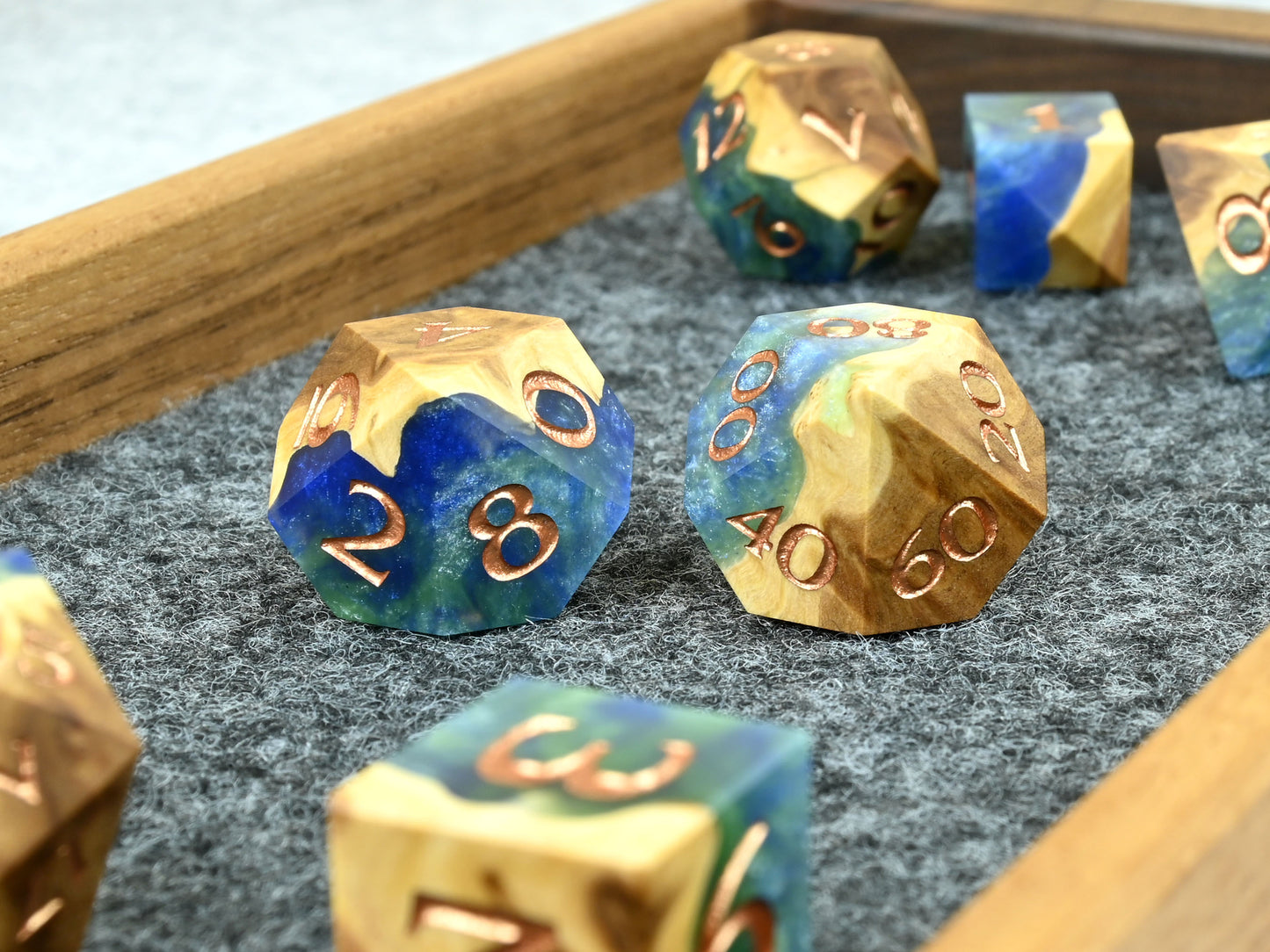 Earth magic brown mallee burl wood and resin hybrid dice set for D&D ttrpg.
