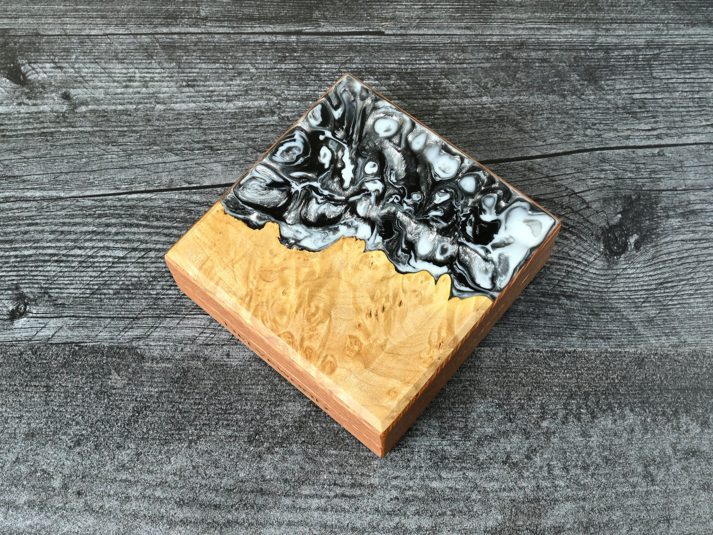 This Little Delver Dice Box features a lacewood core and a maple burl top veneer with black, white, and silver resin. D&D ttrpg.