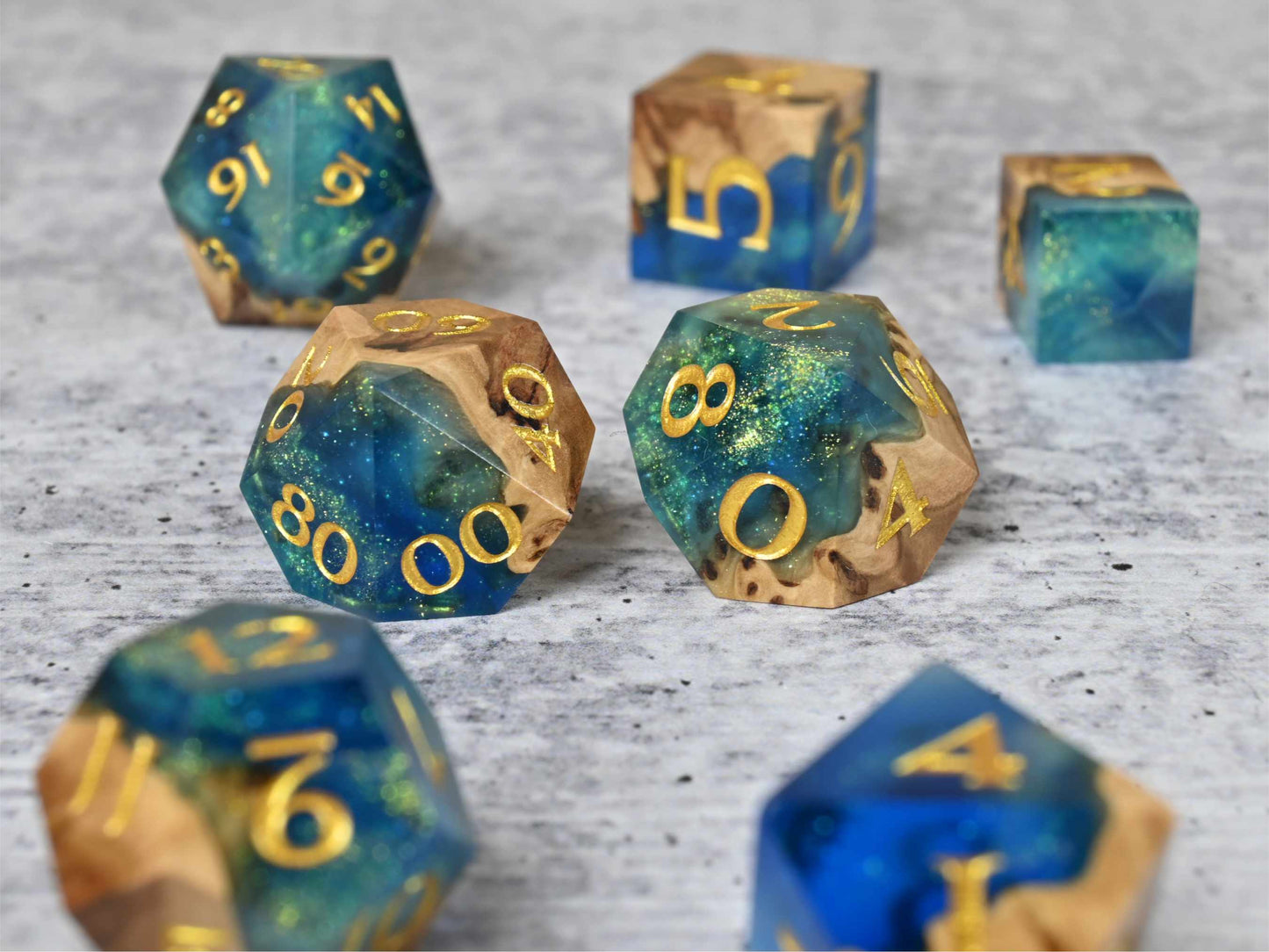 Sunken Treasure Brown Mallee burl wood and resin dice set with gold painted numbers for dnd tabletop rpg