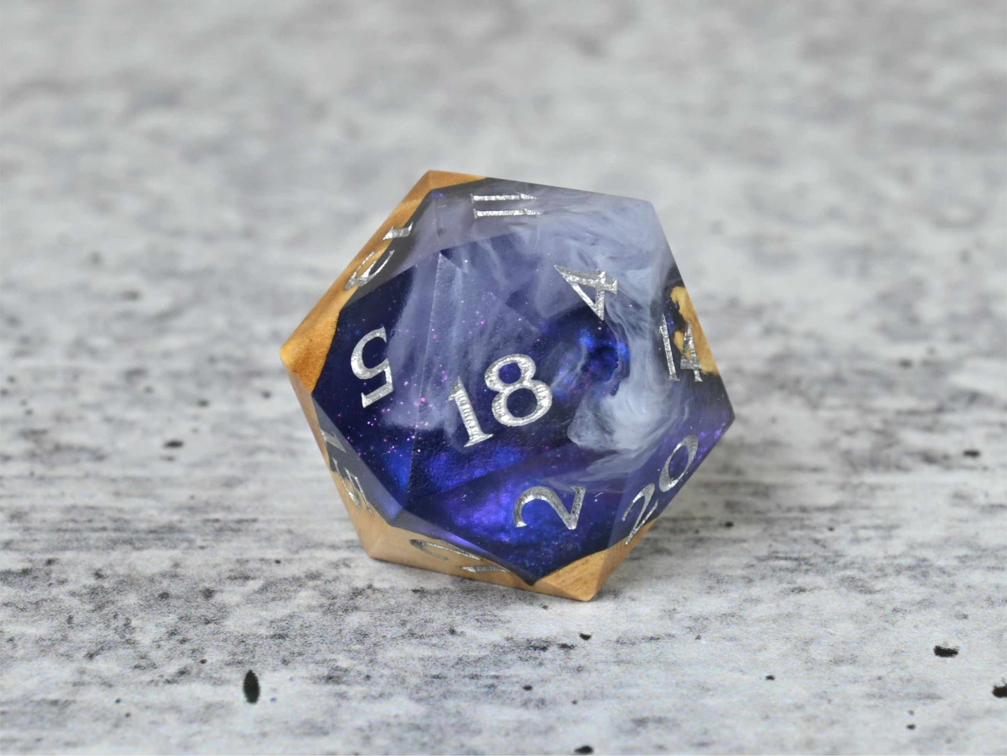 Cloud Nebula Buckeye Burl wood and resin D20 dice with numbers painted silver for dnd ttrpg