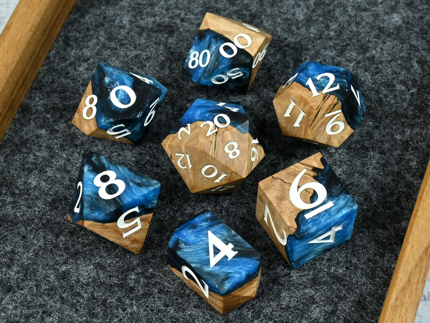 Frost giant coolibah wood and resin hybrid dice set for D&D ttrpg.