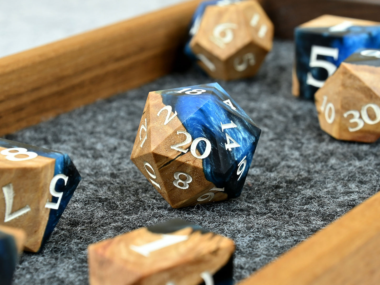 Frost giant coolibah wood and resin hybrid dice set for D&D ttrpg.