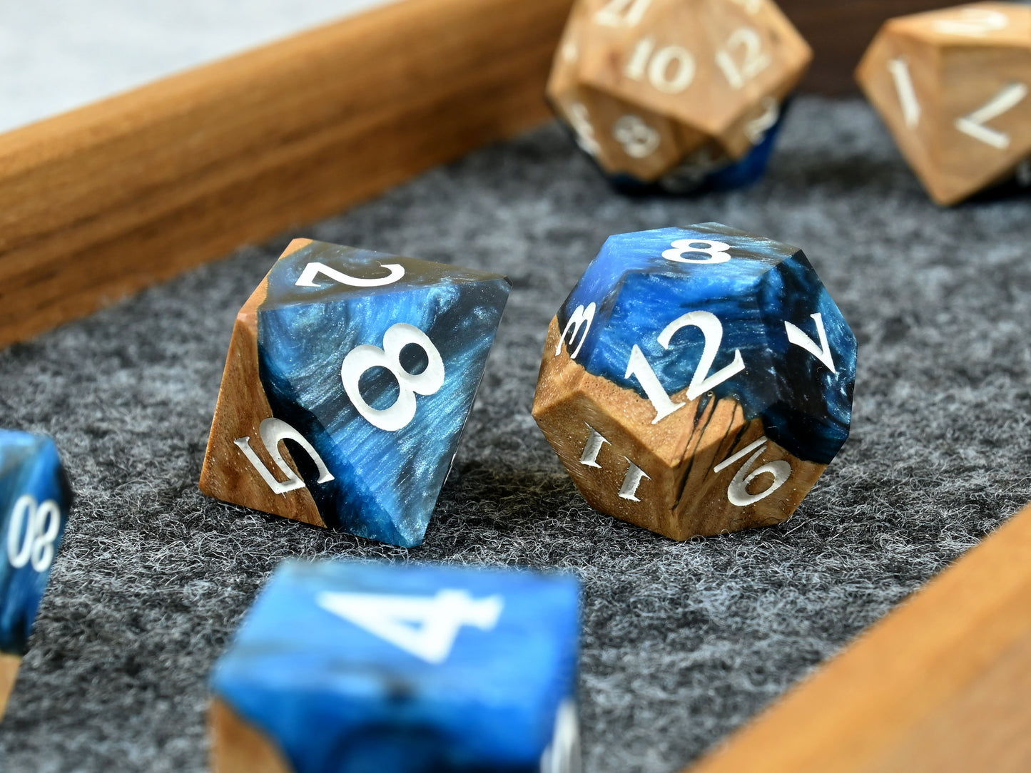 Frost giant coolibah wood and resin hybrid dice set for D&D ttrpg.