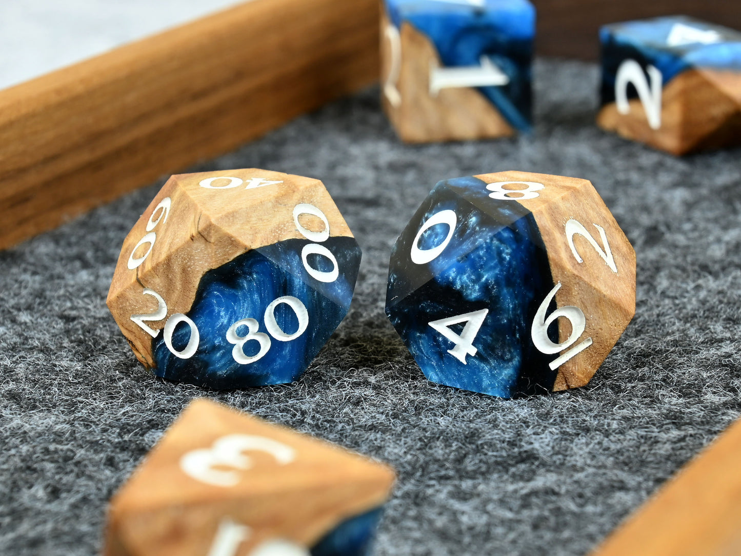Frost giant coolibah wood and resin hybrid dice set for D&D ttrpg.