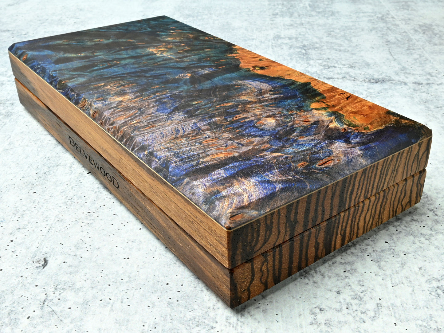 Delver's Kit Dice Box featuring a zebrawood core with a blue and purple dye stabilized maple burl top and maple accent.