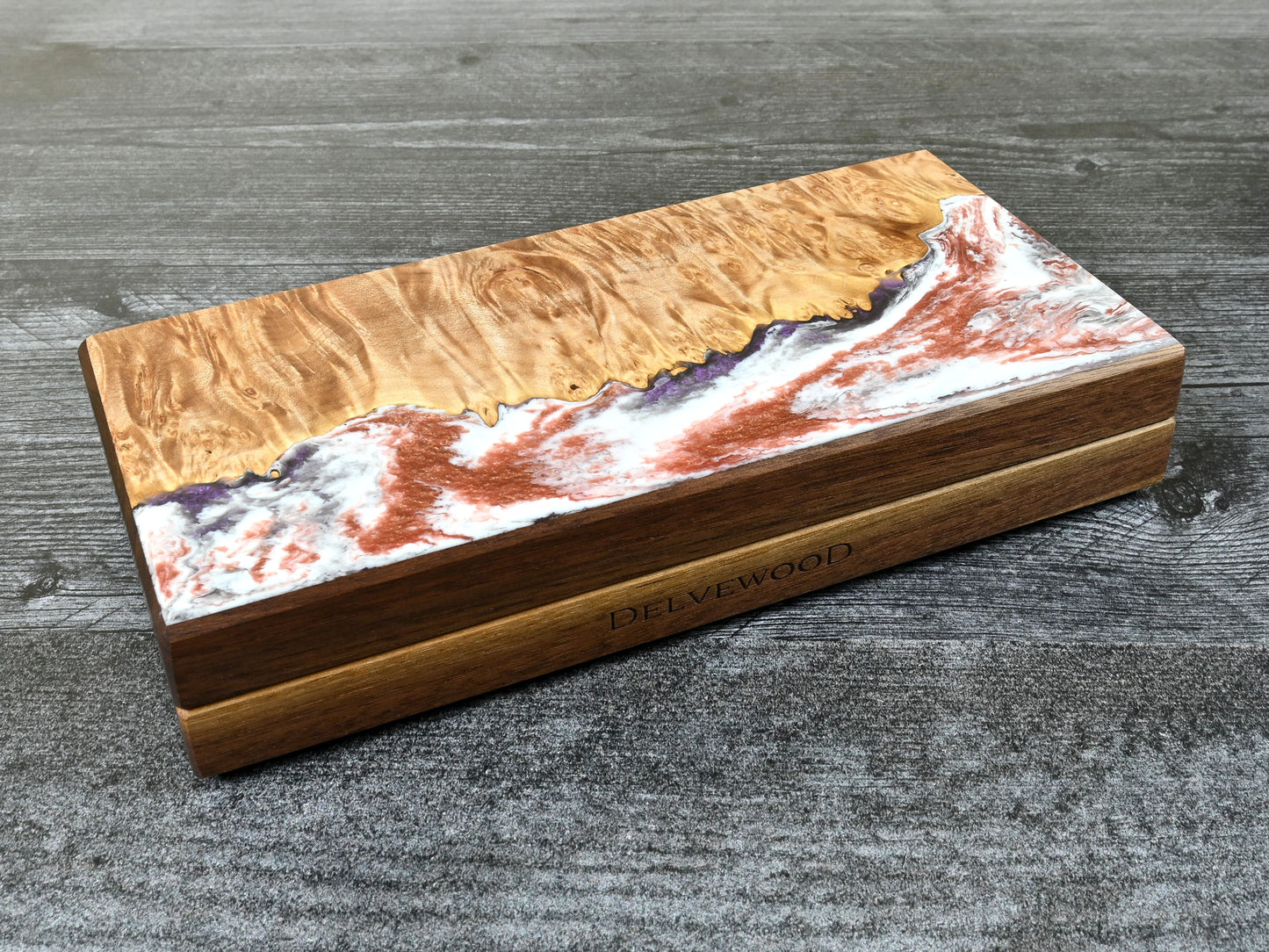 This Delver's Kit Dice Box features a walnut core and a maple burl top veneer with white, bronze, and purple resin. D&D ttrpg.