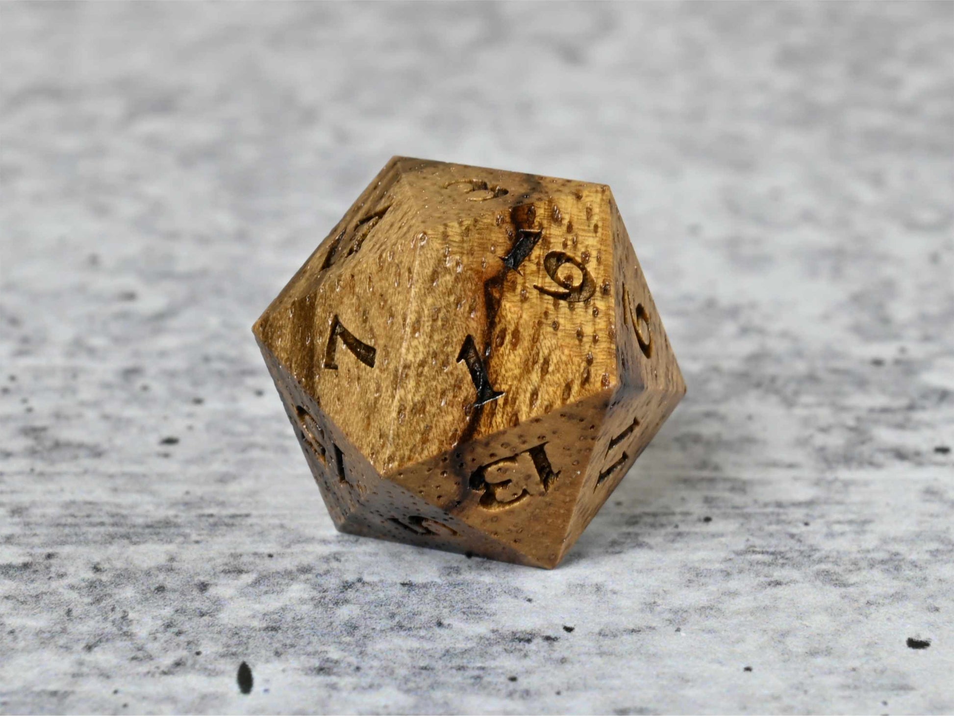 Black Limba wood d20 dice for dnd ttrpg
