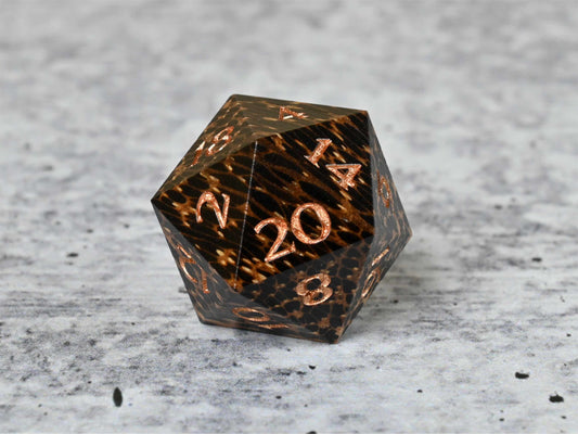 Black Palm wood d20 dice with bronze painted numbers for dnd ttrpg