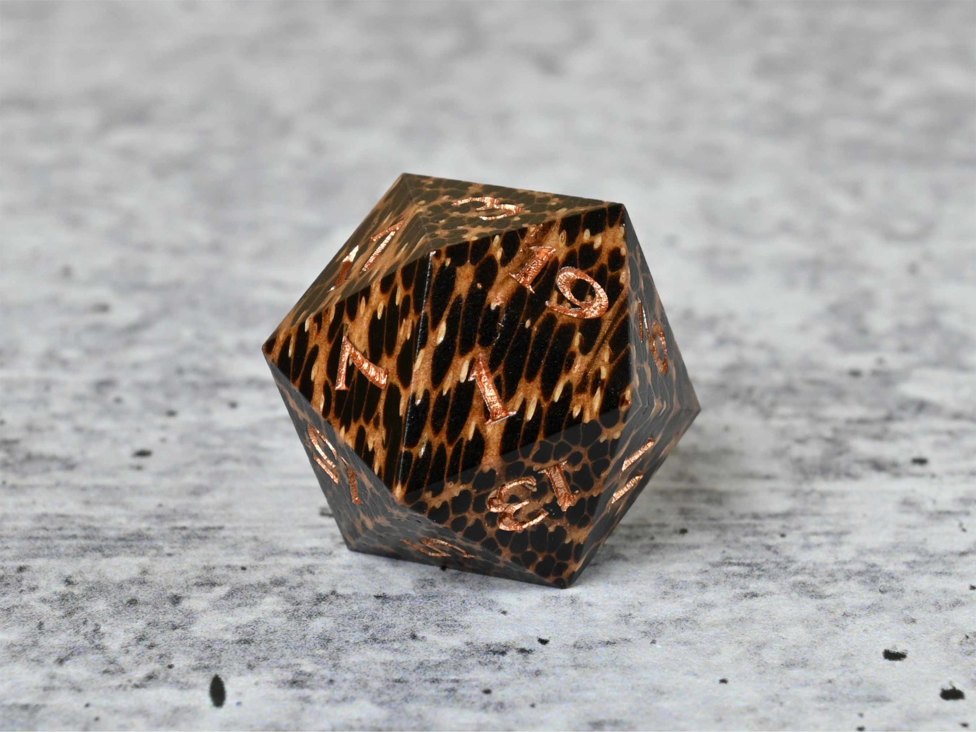Black Palm wood d20 dice with bronze painted numbers for dnd ttrpg