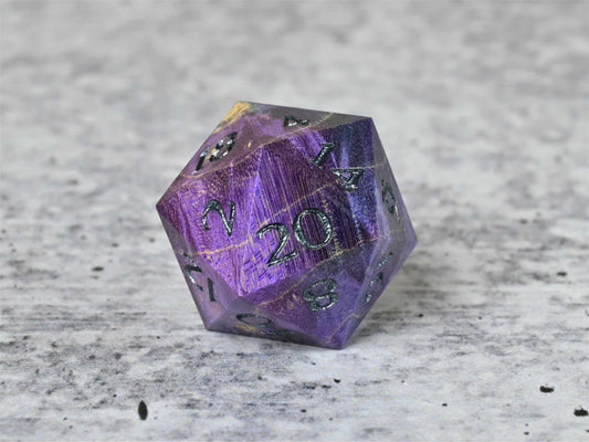 Purple and blue dye stabilized box elder burl wood d20 with dark sliver painted numbers for dnd ttrpg