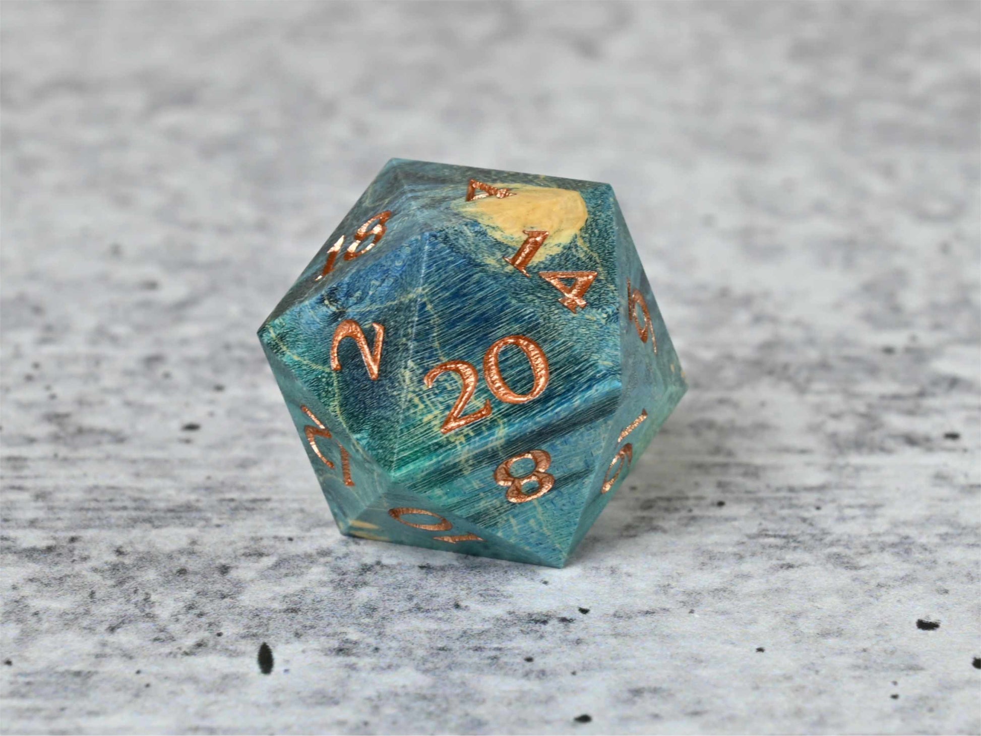 Blue and Teal dye stabilized box elder burl wood d20 wtih bronze painted numbers for dnd ttrpg