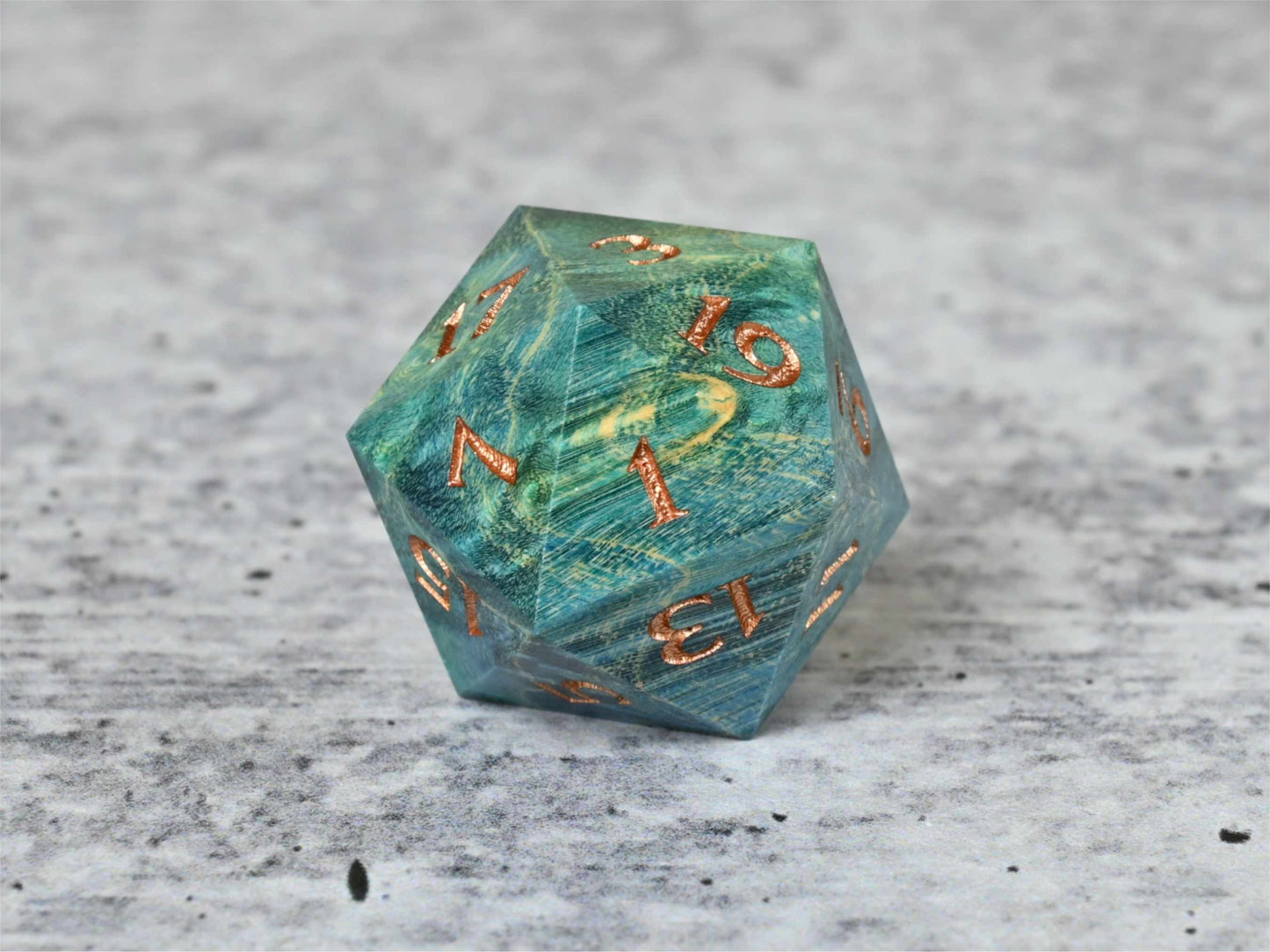 Blue and Teal dye stabilized box elder burl wood d20 wtih bronze painted numbers for dnd ttrpg