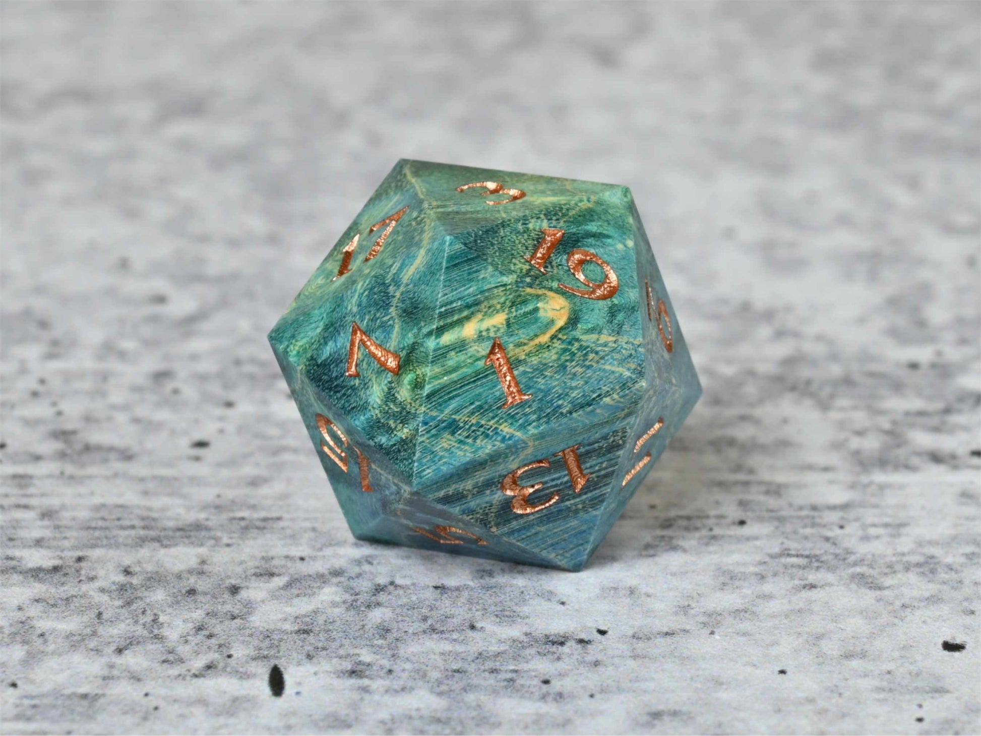 Blue and Teal dye stabilized box elder burl wood d20 wtih bronze painted numbers for dnd ttrpg