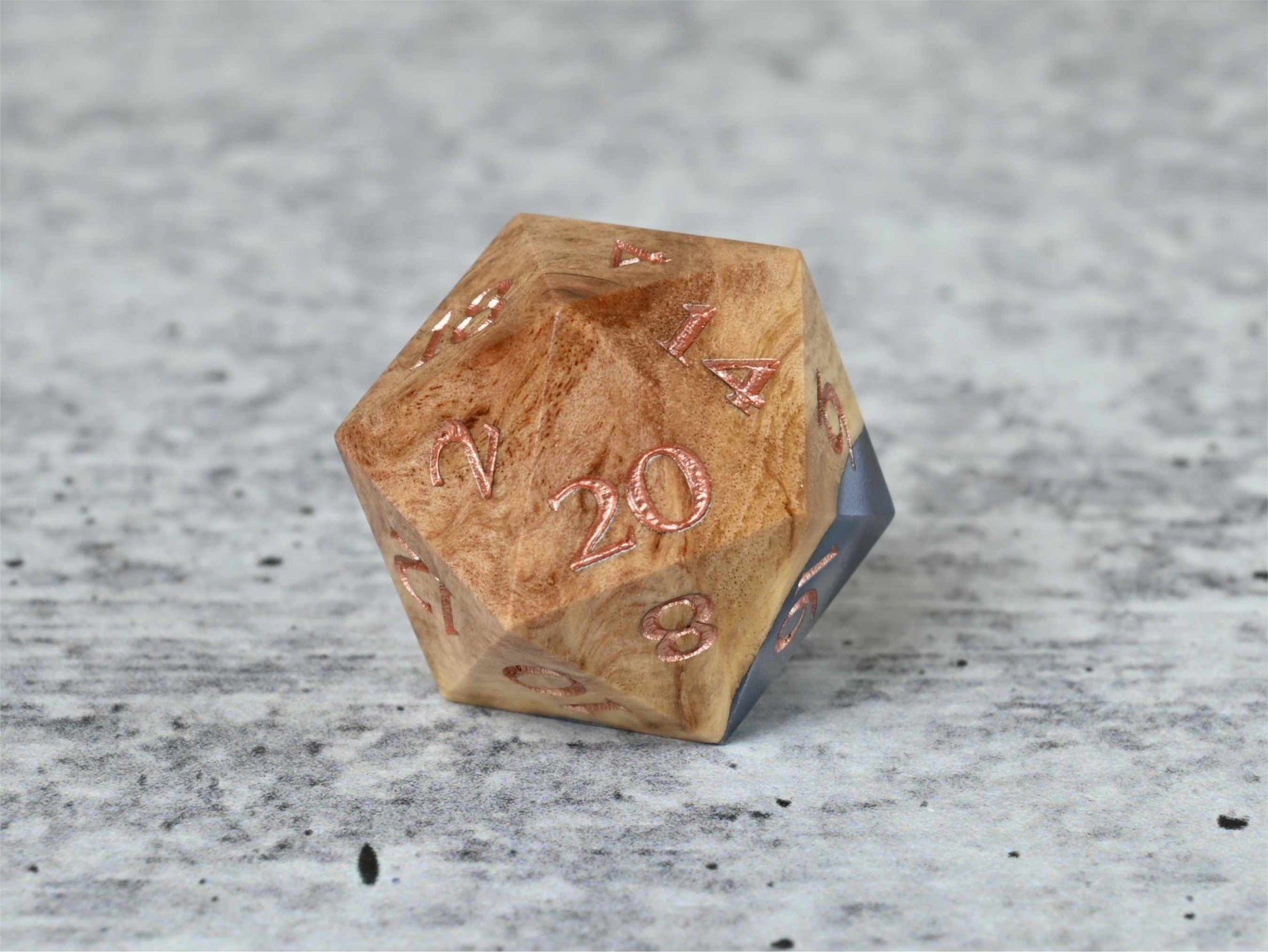 Celestial Solstice Red Mallee Burl D20 dice with numbers painted rose gold for dnd ttrpg