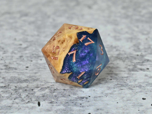 Celestial Solstice Red Mallee Burl D20 dice with numbers painted rose gold for dnd ttrpg
