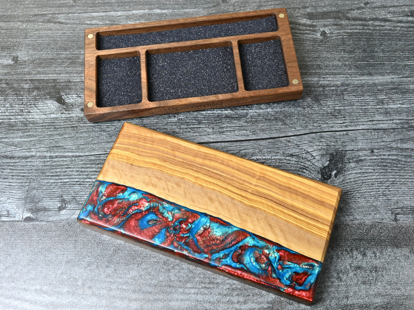 Delver's Kit Dice Box featuring a walnut core and an olivewood top veneer with blue and red resin. Made for D&D ttrpg.