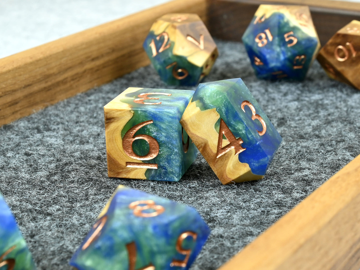 Earth magic brown mallee burl wood and resin hybrid dice set for D&D ttrpg.