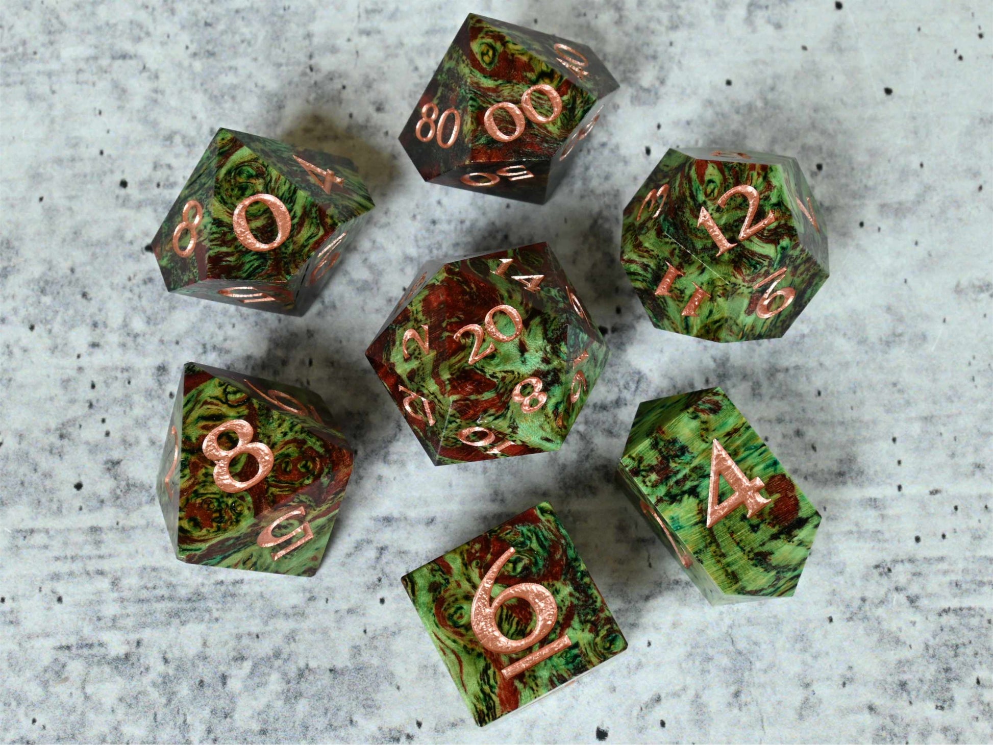 Green and red dye stabilized black ash burl wood dice set with silver painted numbers for dnd ttrpg