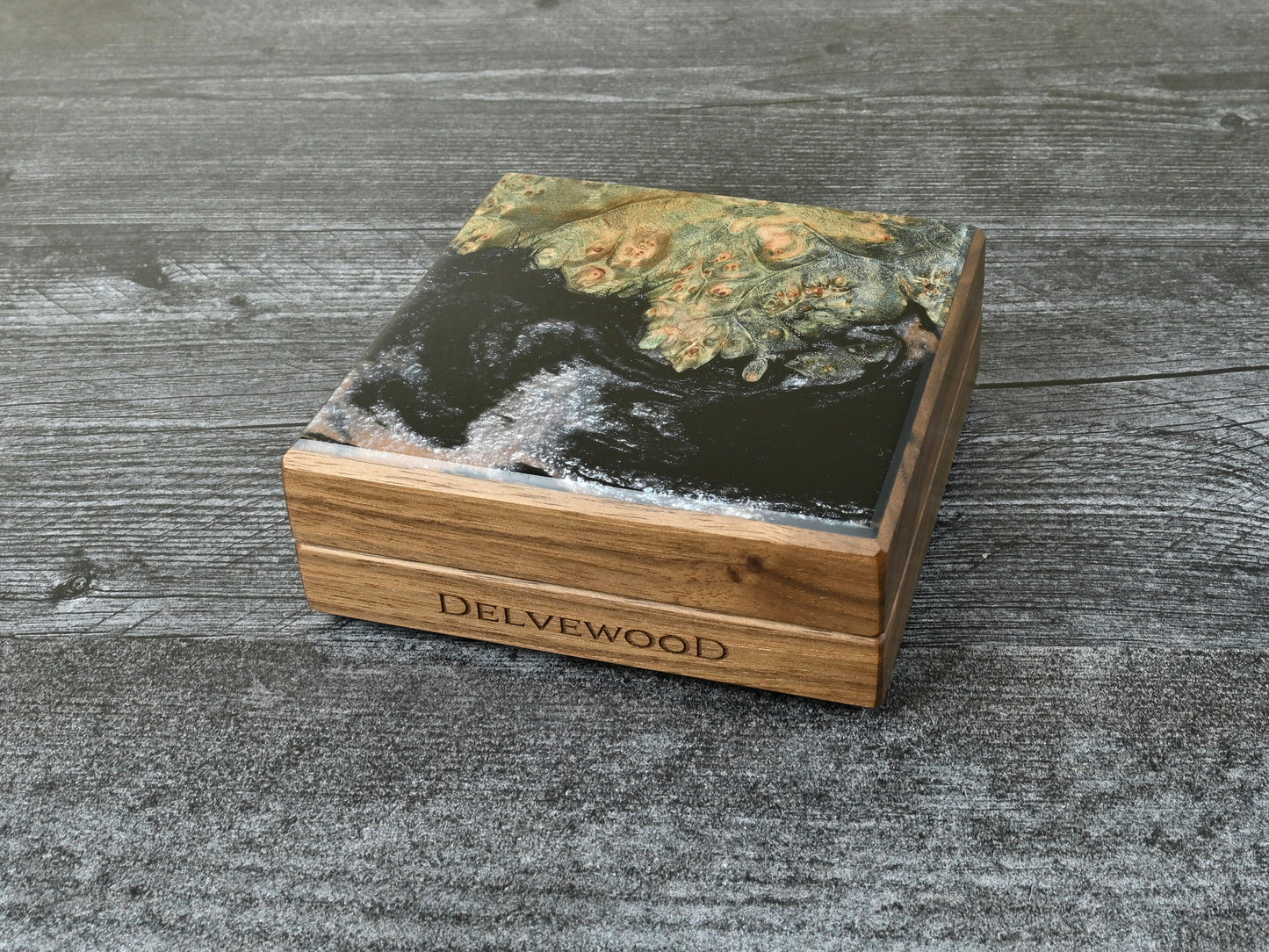Walnut little delver dice box with green/blue maple burl top veneer and black / pearl white resin. D&D ttrpg.