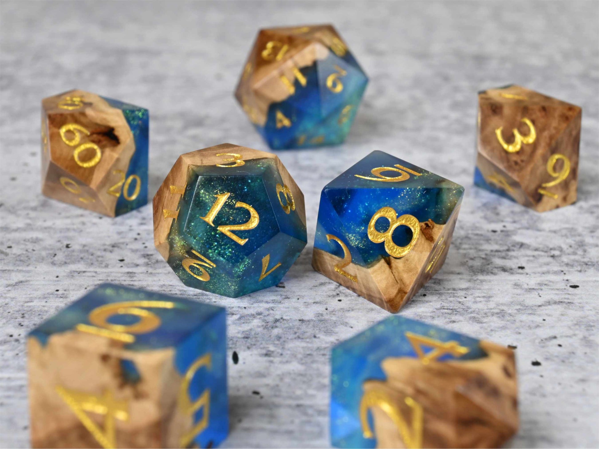 Sunken Treasure Brown Mallee burl wood and resin dice set with gold painted numbers for dnd tabletop rpg