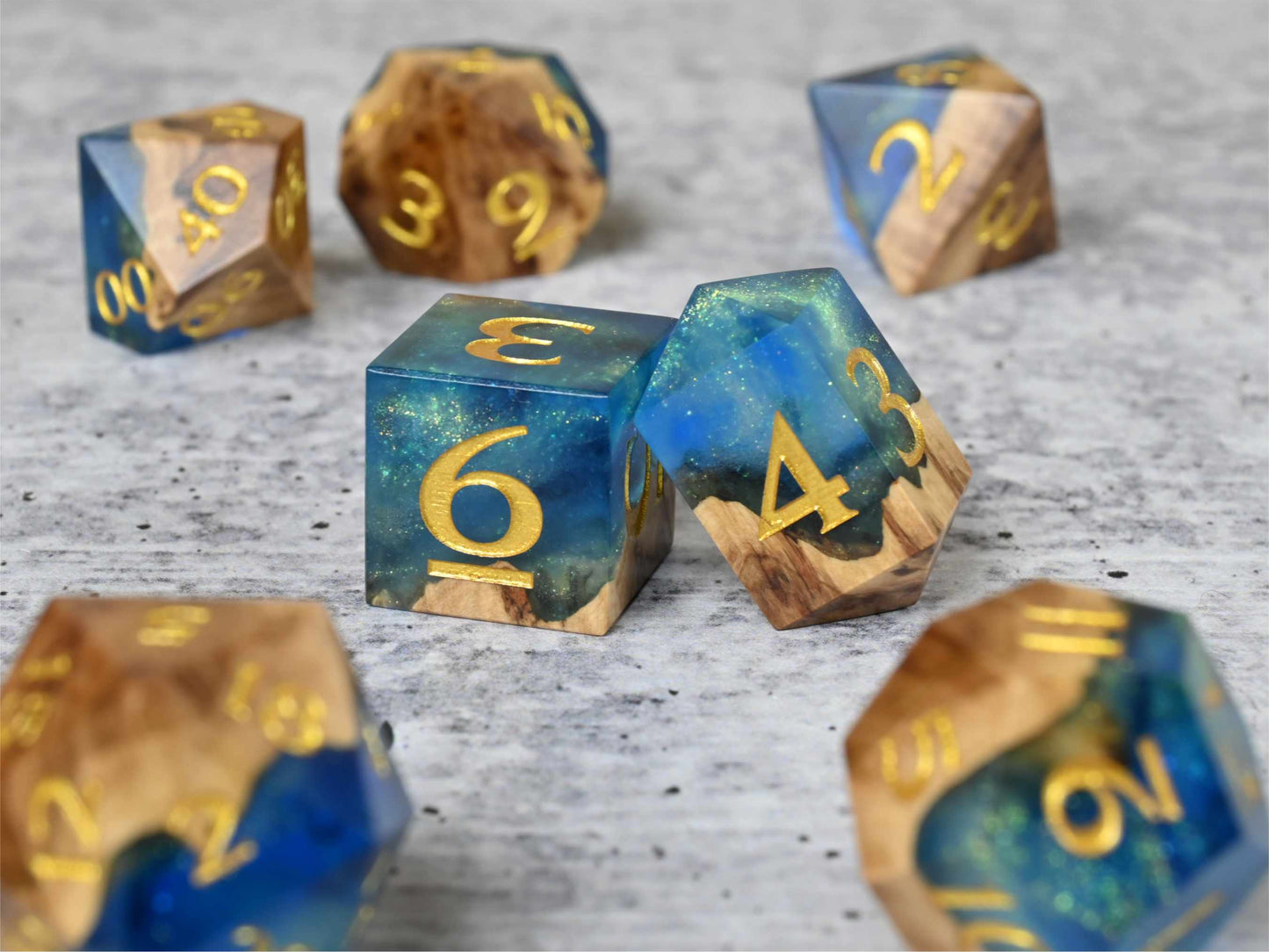 Sunken Treasure Brown Mallee burl wood and resin dice set with gold painted numbers for dnd tabletop rpg