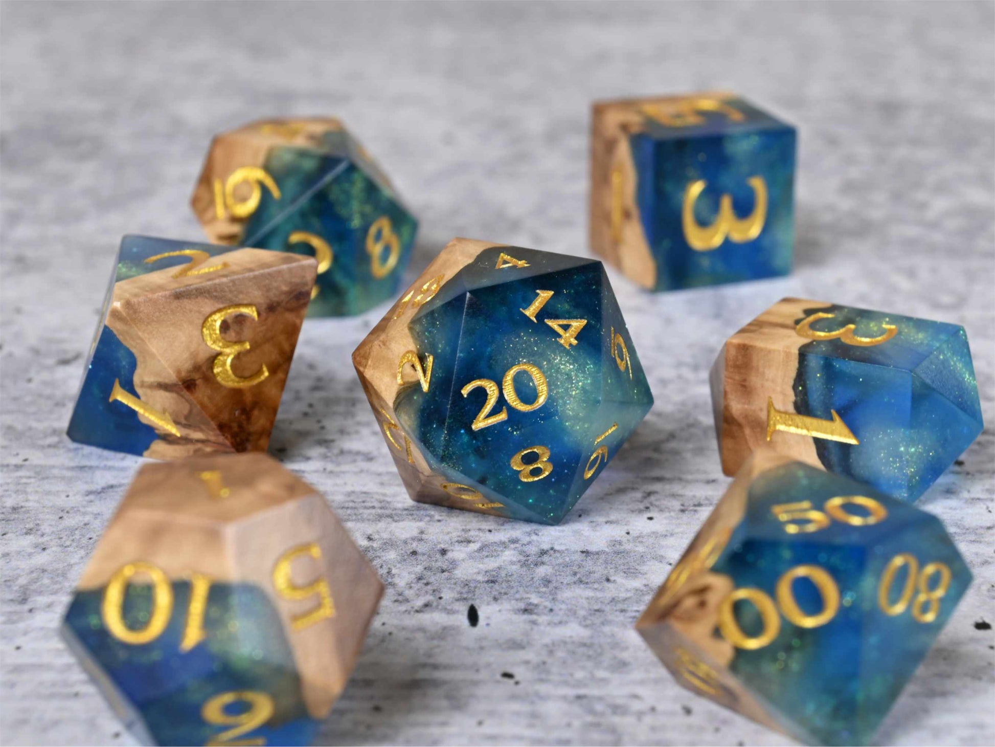 Sunken Treasure Brown Mallee burl wood and resin dice set with gold painted numbers for dnd tabletop rpg