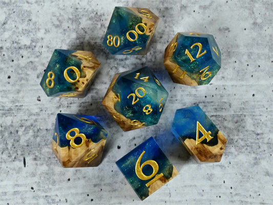 Sunken Treasure Brown Mallee burl wood and resin dice set with gold painted numbers for dnd tabletop rpg