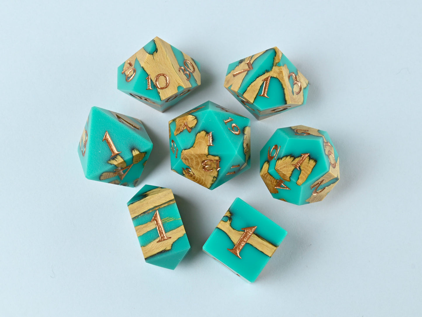 Turquoise cholla wood and resin hybrid dice set with bronze numbers for dnd ttrpg