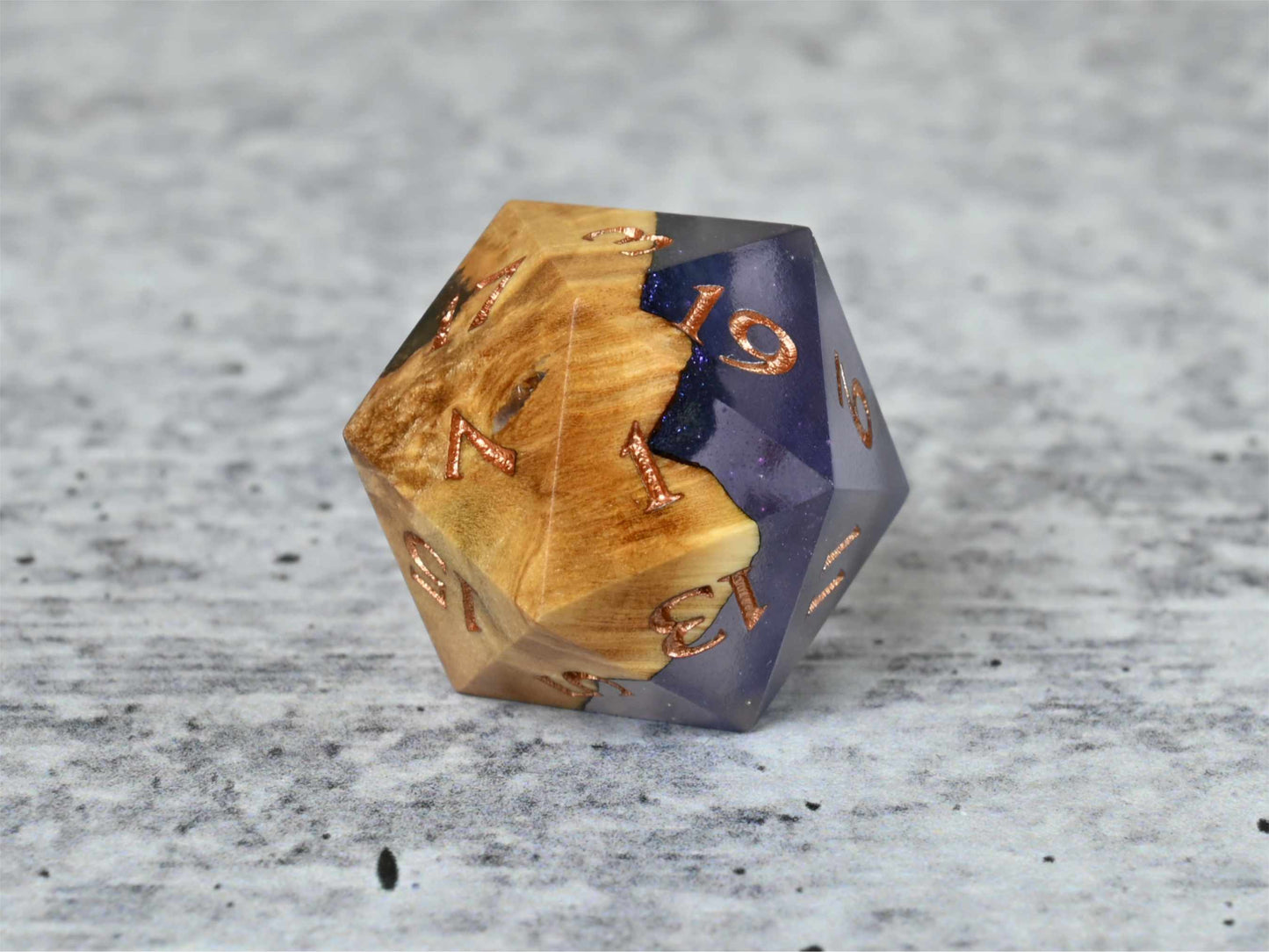 Cloud Nebula Buckeye Burl wood and resin D20 dice with numbers painted rose gold for dnd ttrpg