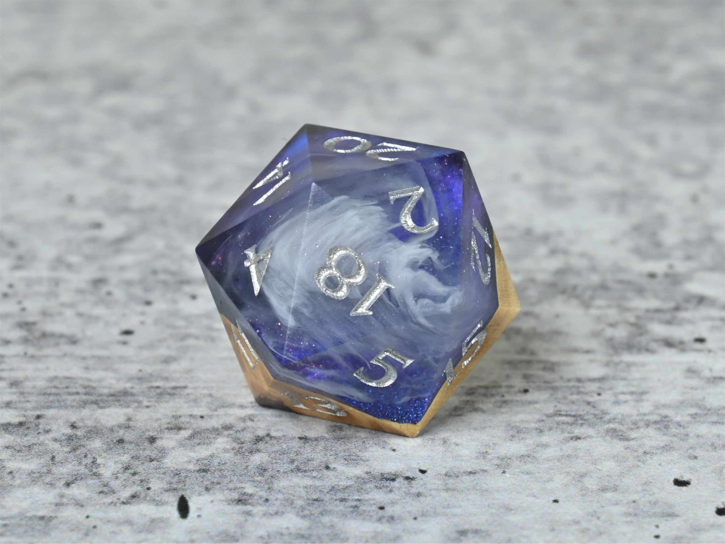 Cloud Nebula Buckeye Burl wood and resin D20 dice with numbers painted silver for dnd ttrpg
