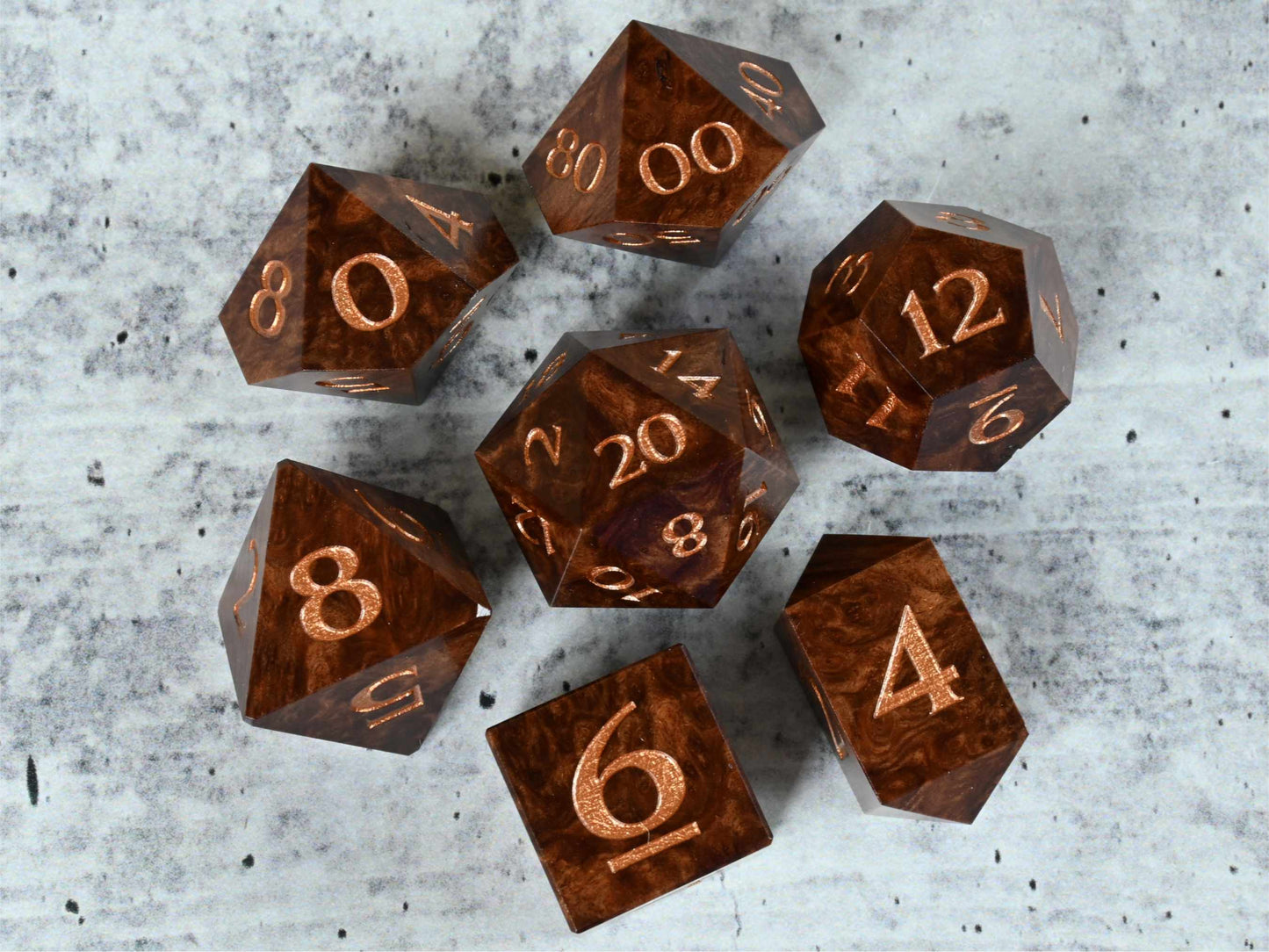 Horistes burl wood dice set with bronze painted numbers for dnd ttrpg