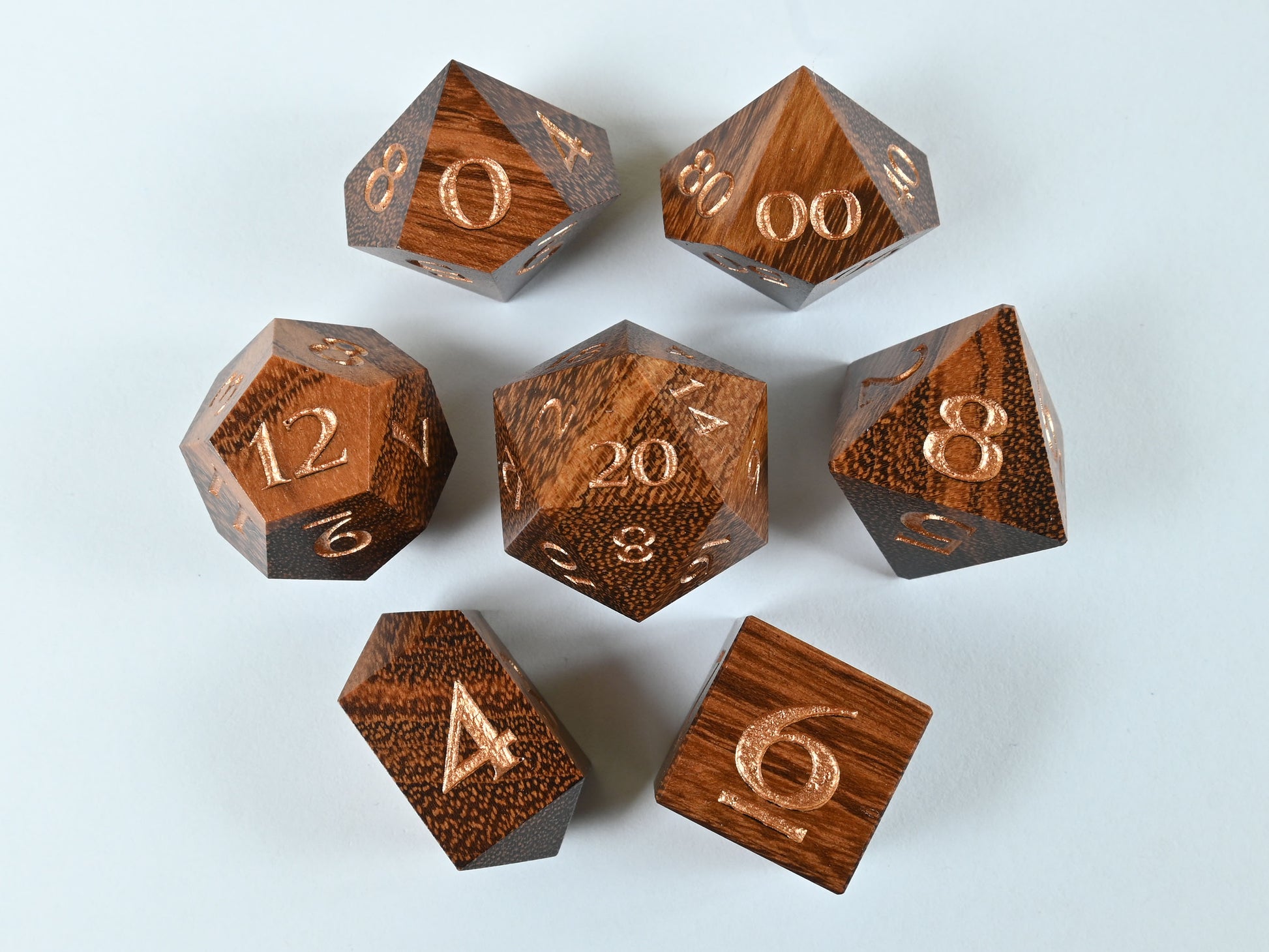 quebracho wood dice set with bronze numbers for dnd rpg