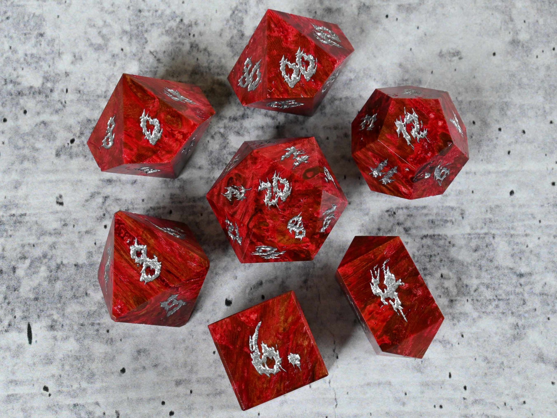 Red dye stabilized spalted maple burl wood dice set with silver painted numbers for dnd ttrpg