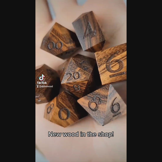Quebracho dice set being rolled into a Delver's kit dice box and tray for Dungeons & Dragons rpg tabletop roleplaying game.