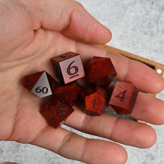 Video of Bloodwood dice set being rolled into a Delver's Kit Dice Box and Tray for dungeons & dragons tabletop roleplaying game
