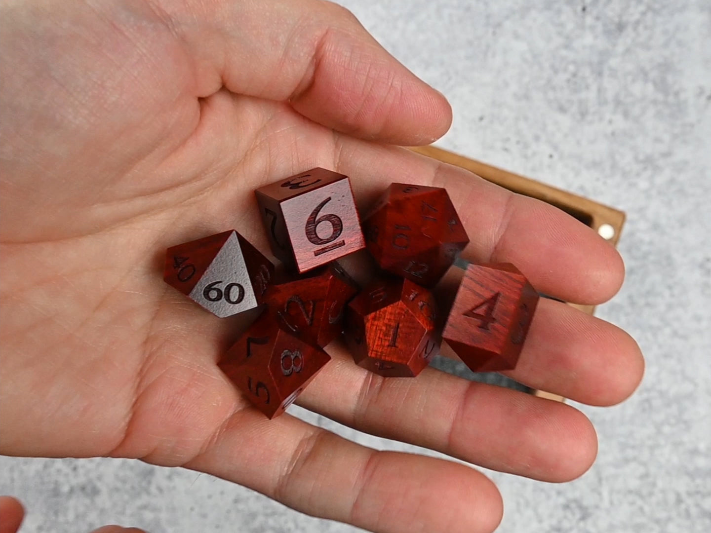 Video of Bloodwood dice set being rolled into a Delver's Kit Dice Box and Tray for dungeons & dragons tabletop roleplaying game