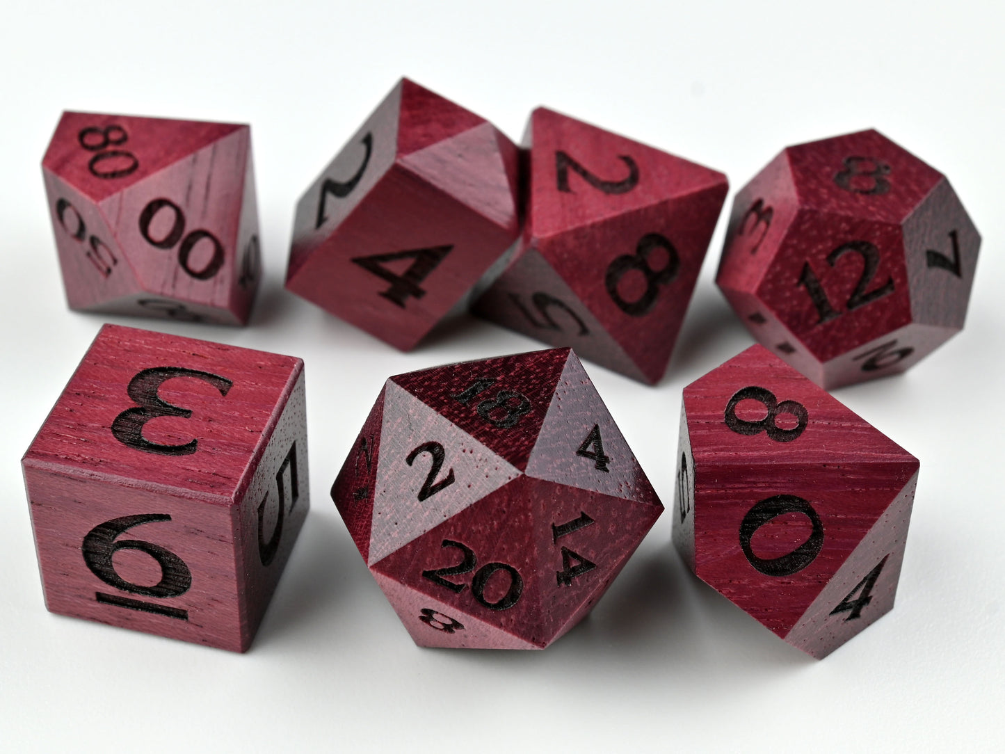 Purpleheart wood polyhedral dice set for dungeons and dragons rpg